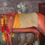 Viharin.com- Kamdhenu cow at the entrance of cave