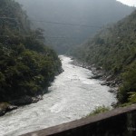 Viharin.com- River flowing between mountains