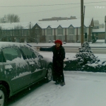 Viharin.com- Myself shoving away snow from car