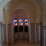 Viharin.com- Designer pillars and walls around coloured glass windows
