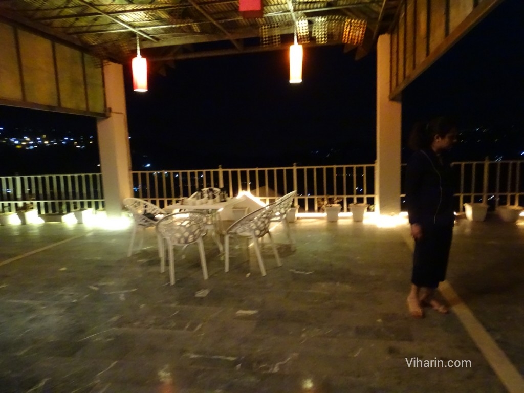 Viharin.com- Experience the dinner at roof top terrace at night in Dunn Perk Manor