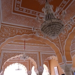 Viharin.com- Intricate designs and royal chandelier on roofs