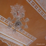 Viharin.com- Intricate designs in the roof with royal chandelier