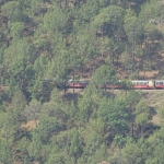 Viharin.com- Toy train passing through hills