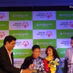 Viharin.com- Athlete being awarded by eminent personalities including Mary Kom