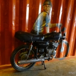 Viharin.com- Rider on half Motorbike and graffiti