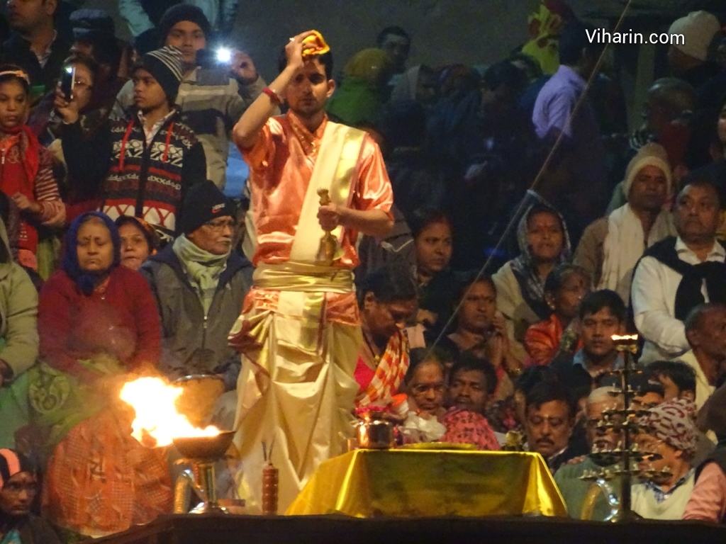 Priest performing prayers during Aarti at Ganga Ji, Varanasi