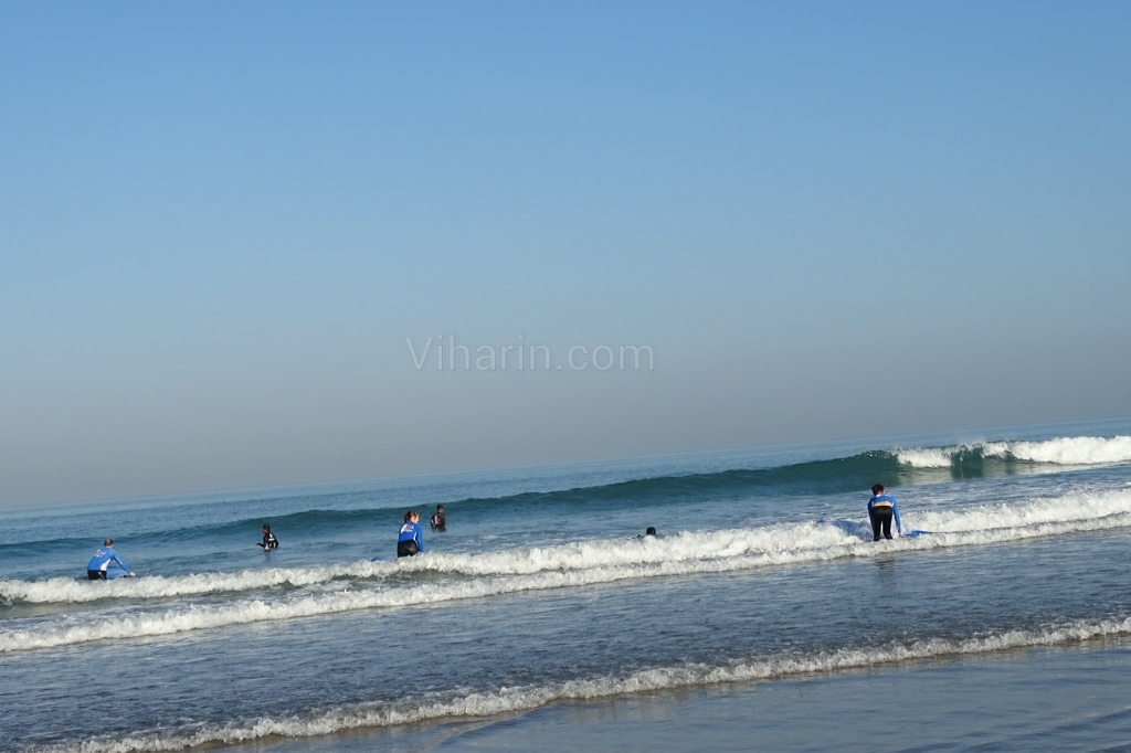 Viharin.com- People doing water surfing